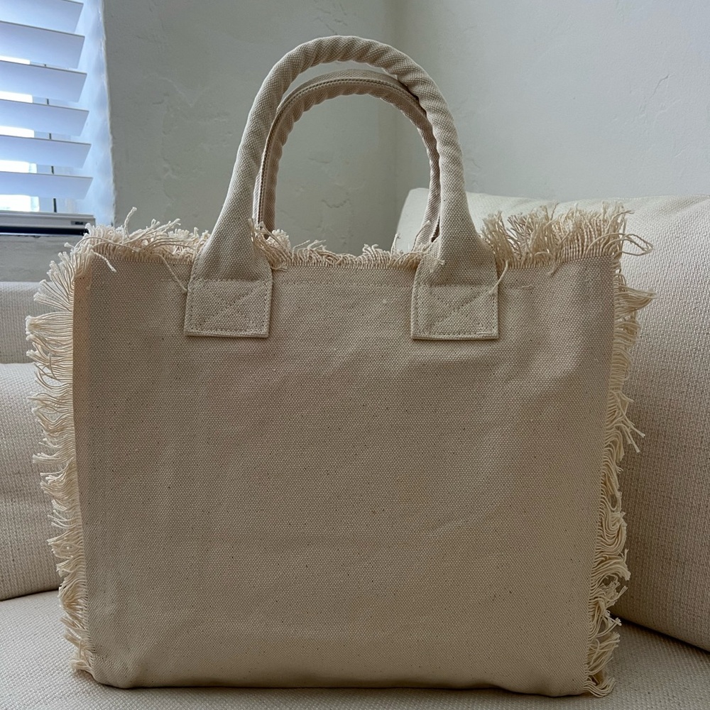 Fringed Canvas Tote Bag

16”w x 15”h x 8”d